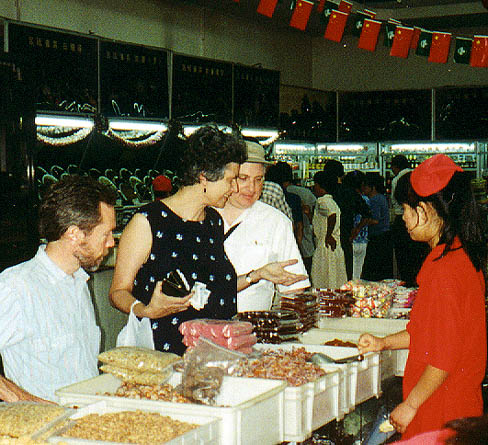 Heath, Suzanne and Jody admiring; Suzanne bought pickled peanuts for a cab-ride snack.